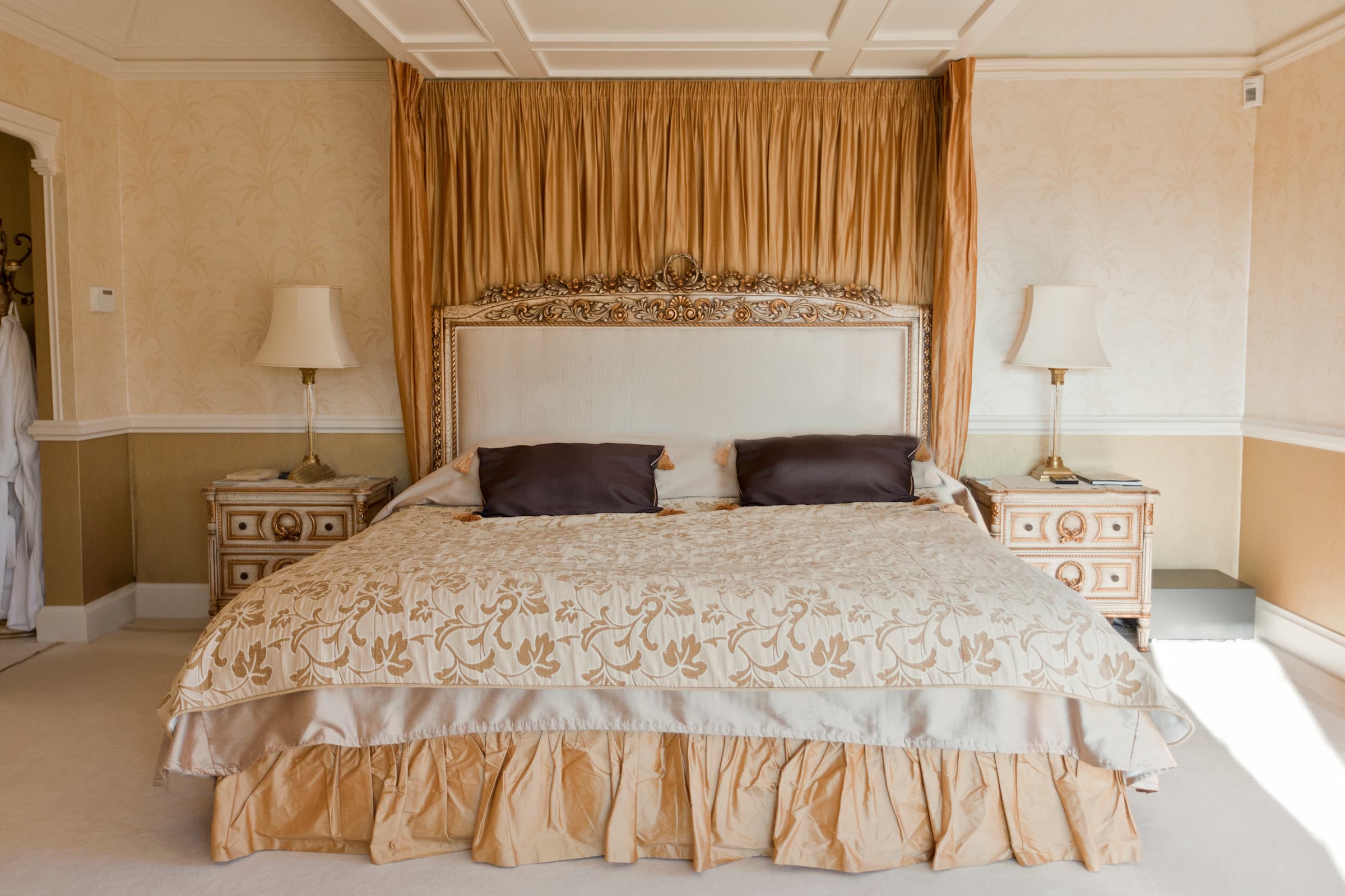 Elegantly appointed bedroom requiring daily attention and care